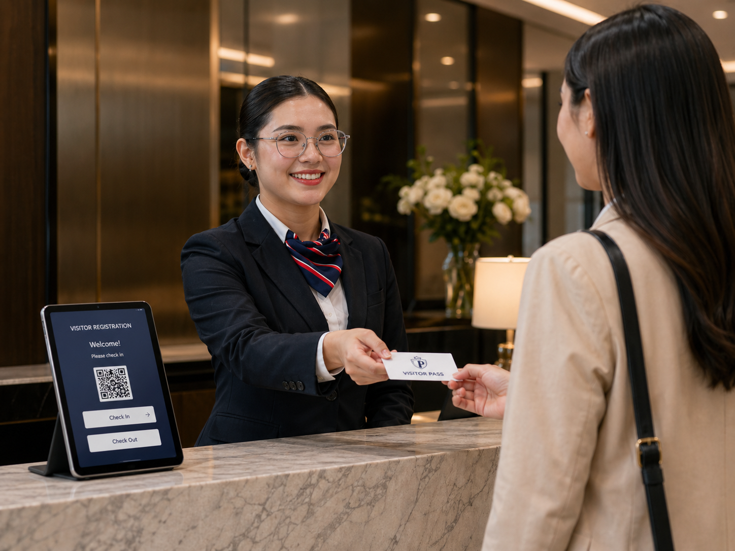 Concierge officer assisting a visitor at reception